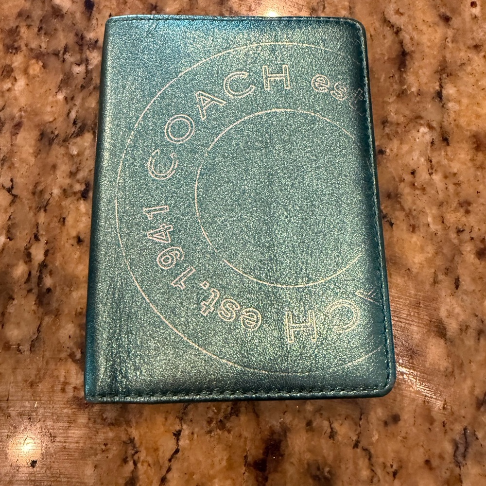 Coach Shimmering Teal Passport cover